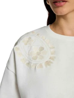 Sweat blanc à motifs avec une coupe droite et des manches longues