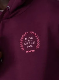 Sweat bordeaux uni avec une coupe droite et un col à capuche