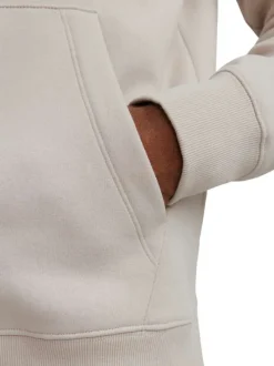 Sweat à capuche beige uni avec une coupe droite et une poche kangourou