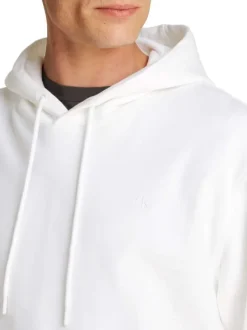 Sweat à capuche en coton blanc avec une coupe droite et un imprimé au dos
