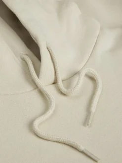 Sweat à capuche en coton mélangé beige avec une coupe relaxed fit