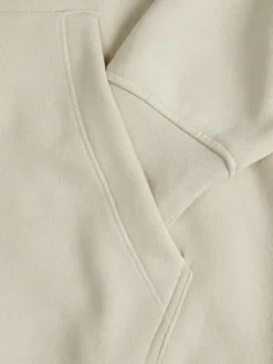 Sweat à capuche en coton mélangé beige avec une coupe relaxed fit