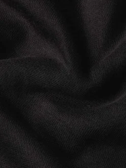 Sweat à capuche en coton noir uni avec une coupe droite et une poche