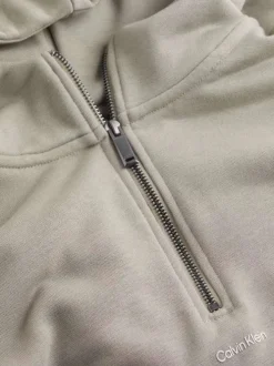 Sweat à capuche zippé en coton mélangé beige uni à coupe droite avec une poche