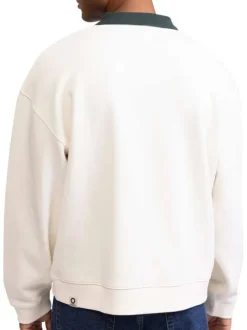 Sweat écru maille en piquée avec une coupe ample et un col polo