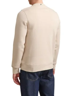 Sweat écru uni avec une coupe droite et des manches longues