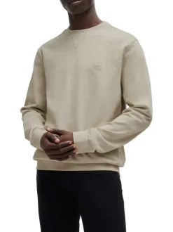 Sweat en coton beige uni avec une coupe regular fit et un patch à la poitrine