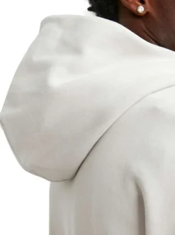 Sweat en coton beige uni coupe droite avec un col à capuche et étiquette cousue