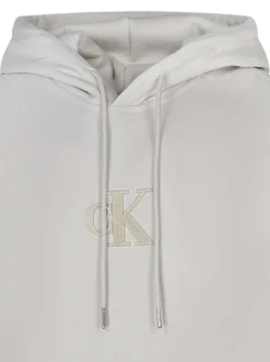 Sweat en coton écru uni à coupe droite avec un logo en relief