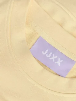 Sweat en coton jaune pourvu d'un col rond et de manches longues