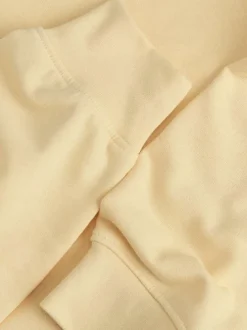 Sweat en coton jaune pourvu d'un col rond et de manches longues