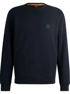 Sweat en coton marine uni avec une coupe regular fit et un patch à la poitrine