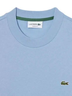 Sweat en coton mélangé bleu à coupe ajustée pourvu d'un col rond