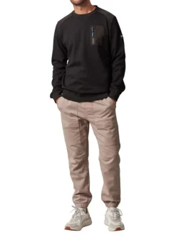 Sweat en coton mélangé noir bi-matière avec un col rond et une poche