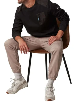 Sweat en coton mélangé noir bi-matière avec un col rond et une poche