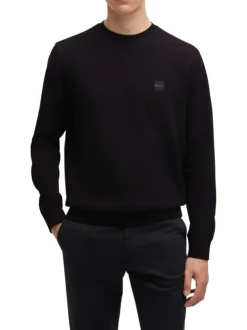 Sweat en coton noir uni avec une coupe regular fit et un patch à la poitrine