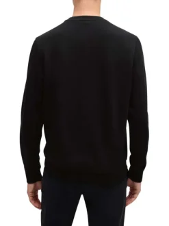 Sweat en coton noir uni avec une coupe regular fit et un patch à la poitrine