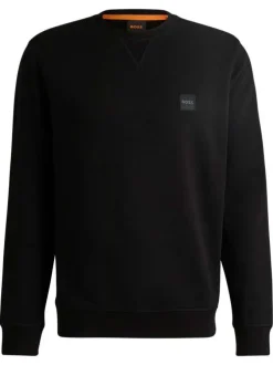 Sweat en coton noir uni avec une coupe regular fit et un patch à la poitrine