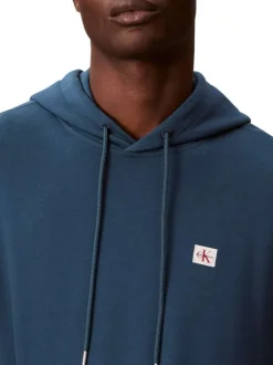 Sweat en coton nuit uni avec une coupe droite et une capuche