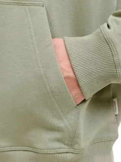 Sweat en coton olive à coupe droite pourvu d'un col à capuche