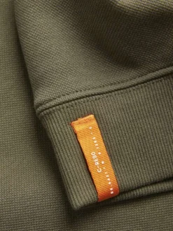 Sweat kaki uni à coupe droite et à col rond avec une poche zippée à la poitrine