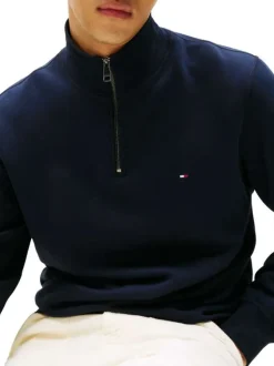 Sweat marine uni avec un col camionneur zippé et des manches longues