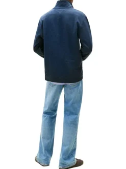 Sweat marine uni avec une coupe droite et un col camionneur