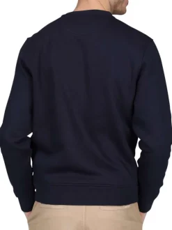 Sweat marine uni avec une coupe droite et un col rond à logo iconique