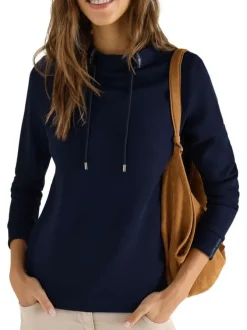 Sweat marine uni pourvu d'une coupe droite et d'un col montant