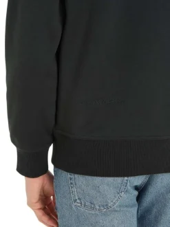 Sweat noir avec une coupe regular fit un col rond et monogramme vert brodé