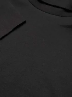 Sweat noir en maille interlock avec une coupe cropped et un col roulé