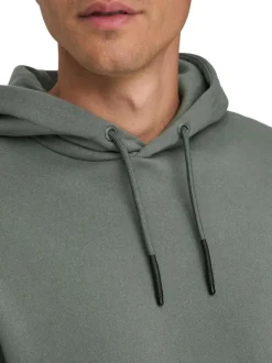 Sweatshirt tilleul uni avec une coupe droite et un col à capuche