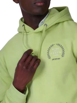 Sweat vert uni avec une coupe droite et une poche kangourou à l'avant