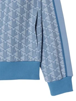 Sweat zippé bleu à coupe droite pourvu d'un col montant et de manches longues