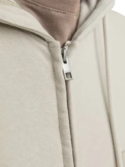 Sweat zippé en coton beige unie coupe droite avec un col à capuche