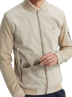 Sweat zippé en coton mélangé beige uni pourvu d'une coupe droite