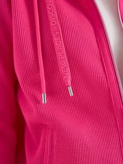 Sweat zippé en coton mélangé fuchsia uni pourvu d'une coupe droite