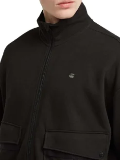 Sweat zippé en coton noir uni avec une coupe droite et un col montant