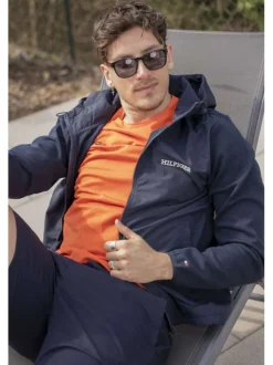 Sweat zippé marine uni avec une coupe droite et une capuche ajustable