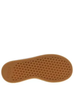 Tennis blanches à talon plat et à bande auto-agrippantes avec trous