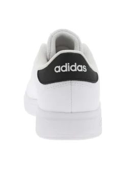 Tennis blanches et noires à semelle plate avec 3 bandes perforées et lacets