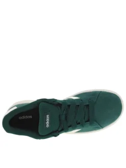 Tennis en cuir vertes à semelle écrue et maron avec lacets plats et logo blanc