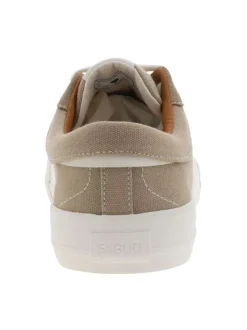 Tennis beiges avec une fermeture à lacets et des surpiqûres blanches