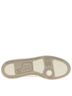 Tennis beiges à semelle plate avec une fermeture à lacets et zip latéral