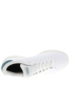 Tennis blanches avec contrefort contrasté et semelle à talon plat