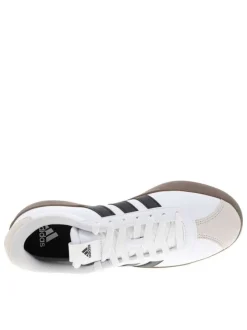 Tennis blanches avec semelle à talon plat avec empiècements en cuir nubuck