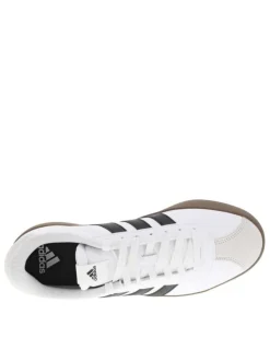 Tennis blanches avec semelle à talon plat avec empiècements en cuir nubuck