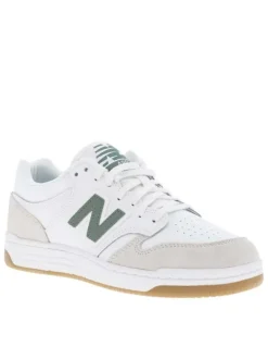 Tennis blanches à détails verts avec des lacets plats tressés