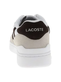 Tennis blanches en cuir à talon plat avec des lacets et logo marron