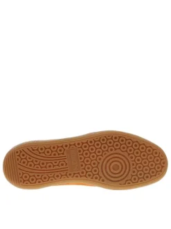 Tennis blanches et oranges avec des empiècements en daim et à lacets plats
